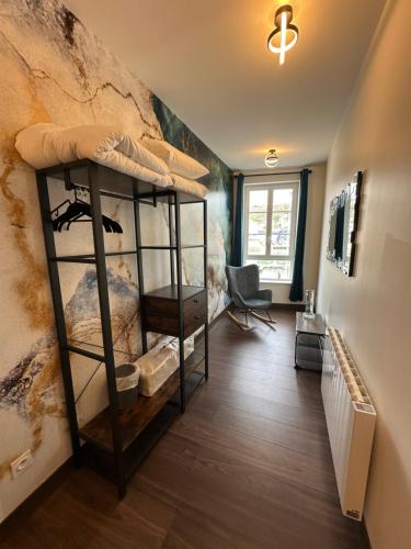 a hallway with bunk beds in a room at Captain YOO - Ginkgo Biloba - Cocon moderne sur le port in Fécamp