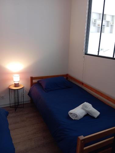 Postel nebo postele na pokoji v ubytování Joli havre de paix