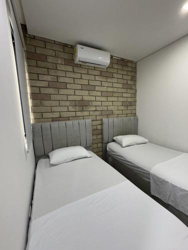 Postel nebo postele na pokoji v ubytování Espectacular Apartamento Amoblado - 2 Habitaciones