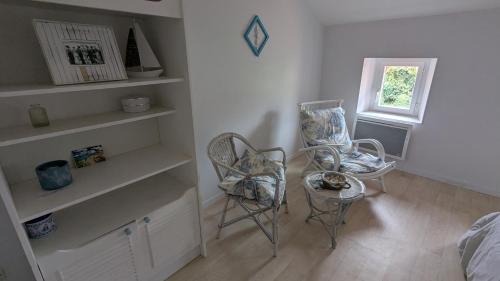 Posezení v ubytování Chambre dans un cadre bucolique avec petit-déjeuner