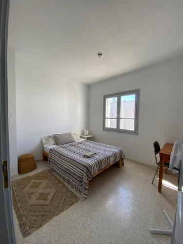 Ένα ή περισσότερα κρεβάτια σε δωμάτιο στο Gammarth home