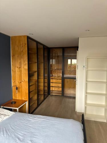 Ένα ή περισσότερα κρεβάτια σε δωμάτιο στο Appartement moderne à Metz 76 m², climatisé
