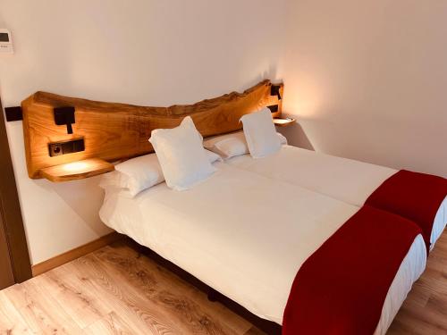 Letto o letti in una camera di A Reigada Hotel Restaurante