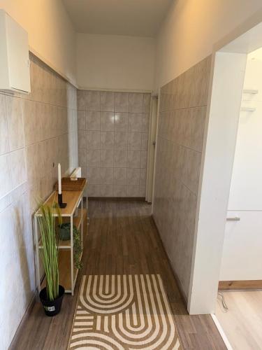 a home office with a desk and a table at Modern Living - Im Grund in Spaichingen