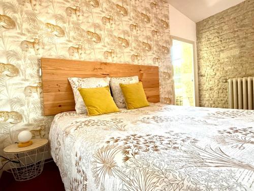 Ένα ή περισσότερα κρεβάτια σε δωμάτιο στο Les Villas de Grammont 260