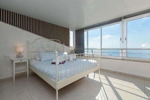 A bed or beds in a room at Adosado Bellavista B By homevillas360