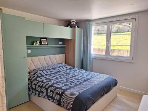 Postel nebo postele na pokoji v ubytování Alpine ski apartment - Petit Châtel