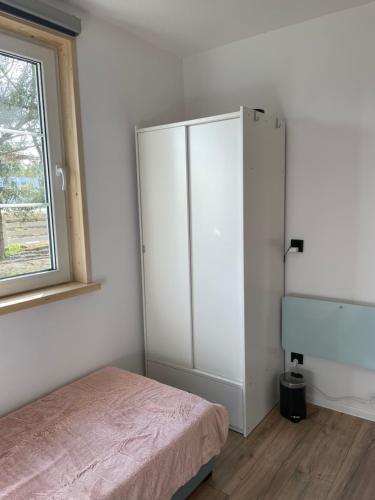 Postel nebo postele na pokoji v ubytování Domek 5xA