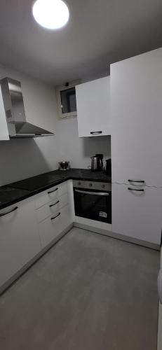 Η κουζίνα ή μικρή κουζίνα στο Villa Monni