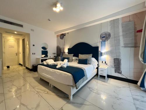 Postel nebo postele na pokoji v ubytování Positano Art Hotel Pasitea