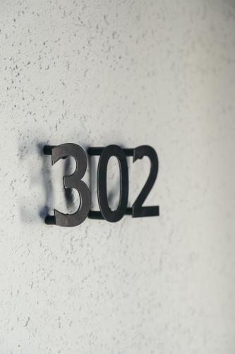 a sign on a wall with the on it at Primus Nefes Adult Only in Alacati