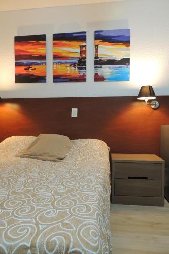 Una cama o camas en una habitación de Punta del Este Shelton Hotel