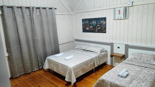 Ένα ή περισσότερα κρεβάτια σε δωμάτιο στο Casa di Day
