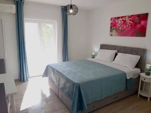Postel nebo postele na pokoji v ubytování Studio apartman Marley