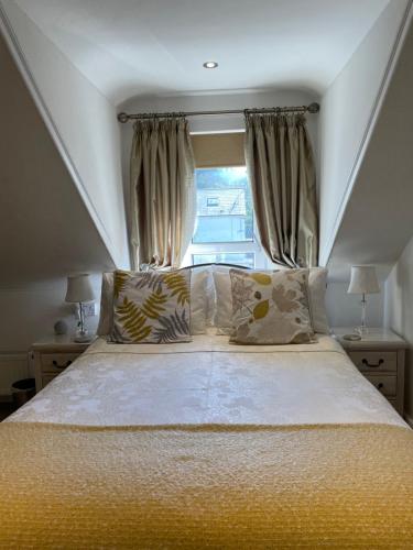 Katil atau katil-katil dalam bilik di Trefoil Guest House