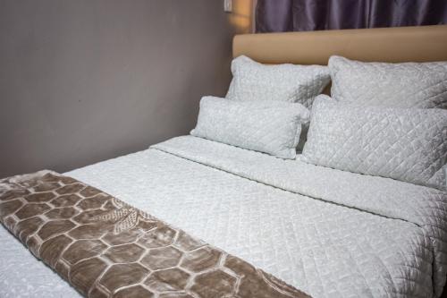 Ένα ή περισσότερα κρεβάτια σε δωμάτιο στο Nangoma Safari Lodge Manyumbi