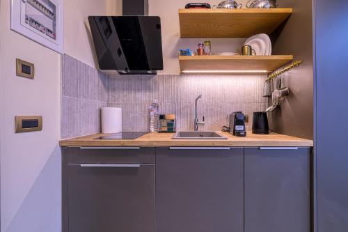 a kitchen with a sink and a counter top at Nafplia Castle in Nafplio