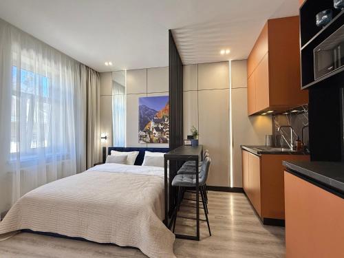Η κουζίνα ή μικρή κουζίνα στο НОВЕ! MIAMO Apartments Лисенка 11