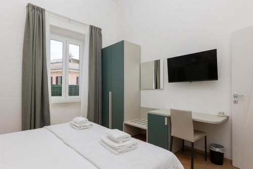 Katil atau katil-katil dalam bilik di Hotel Amalfi