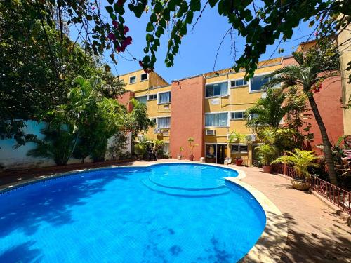Πισίνα στο ή κοντά στο Suites Cancun Center