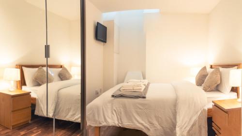 Ένα ή περισσότερα κρεβάτια σε δωμάτιο στο b&b in Edinburgh