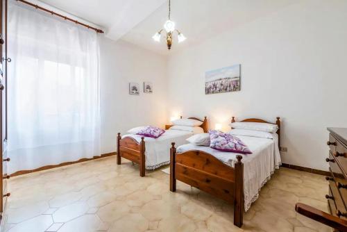 Postel nebo postele na pokoji v ubytování Teulada Rustic Charm 5