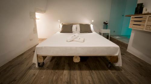 Posteľ alebo postele v izbe v ubytovaní ViaGiusti 51