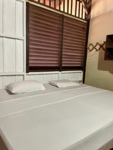 Una cama o camas en una habitación de OeNic! Hostal