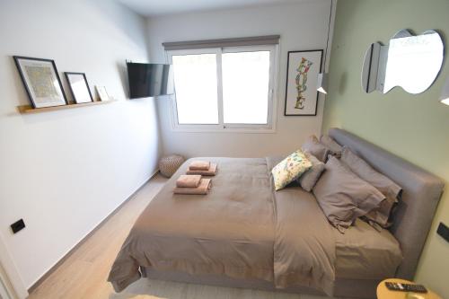 Postel nebo postele na pokoji v ubytování Kalafatis Garden House