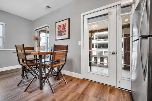 a dining room with a table and chairs at Cle Suites 2BR 1BA 5 min Walk to Cle Clinic Unit 4 in Cleveland