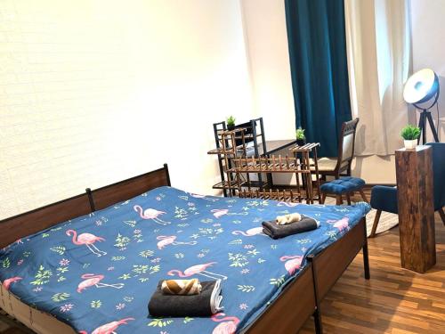 a bedroom with a bed with pink flamingos on it at Piano Apartment Halle - Netflix - Free WiFi 6 in Halle an der Saale