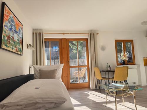 Postel nebo postele na pokoji v ubytování Alpenflair Apartments