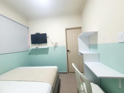 Μια τηλεόραση ή/και κέντρο ψυχαγωγίας στο Hotel HIH