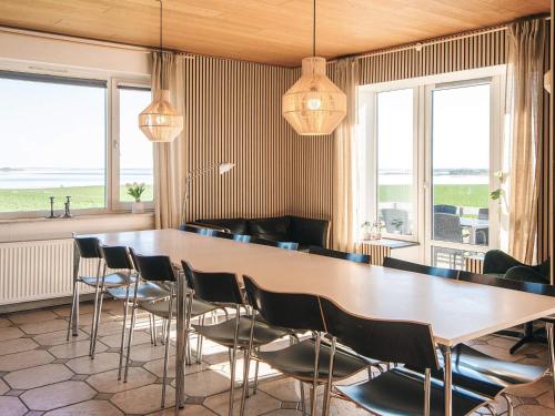 a conference room with a large table and chairs at 20 person holiday home in Karby-By Traum in Karby