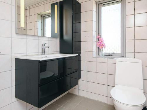 a bathroom with a sink and a toilet at 5 person holiday home in Snedsted in Snedsted