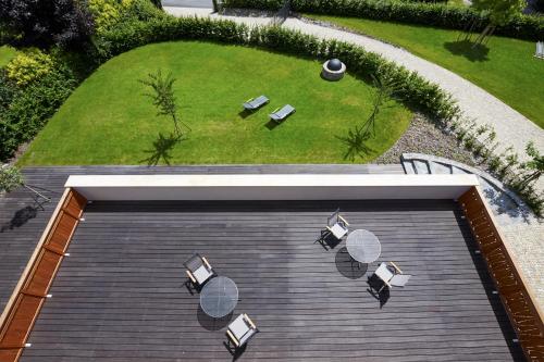 an aerial view of a garden with tables and chairs at Pension Ježník in Krnov
