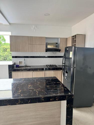 Kuchyň nebo kuchyňský kout v ubytování Hermoso apartamento en alquiler con jacuzzi