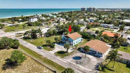 an aerial view of a house and the ocean at Seaside Serenity Cozy By The Sea in Fort Pierce