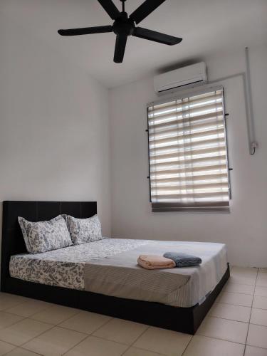 Postel nebo postele na pokoji v ubytování Unit 2 Islam Taqwa Homestay