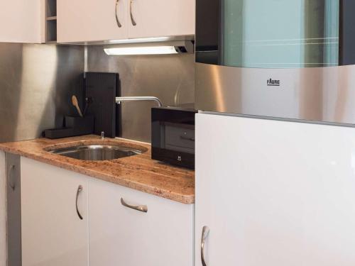 Photo de la galerie de l'établissement Confort moderne à Val Thorens – 5 pers, skis aux pieds, quartier calme - FR-1-637-87, à Val Thorens