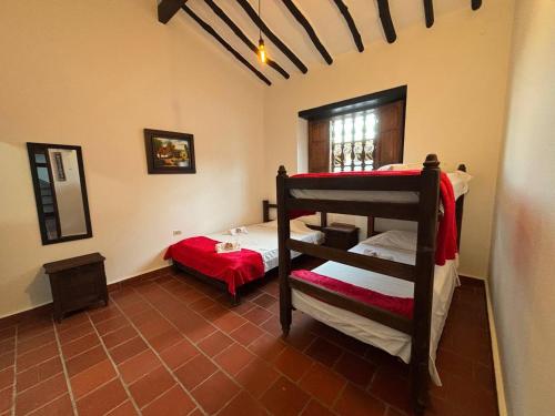 Letto o letti in una camera di Kazasha - Hotel Con Parqueadero Privado