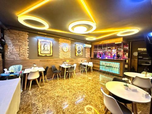 Restoran atau tempat lain untuk makan di Rest Apartments by Nava Hotel