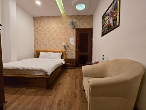 Katil atau katil-katil dalam bilik di Hoàng Việt 2 Hotel