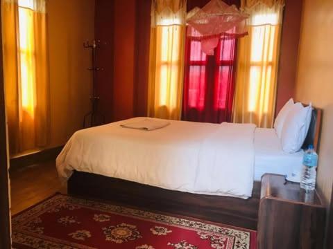 Un ou plusieurs lits dans un hébergement de l'établissement Hotel Sweetland