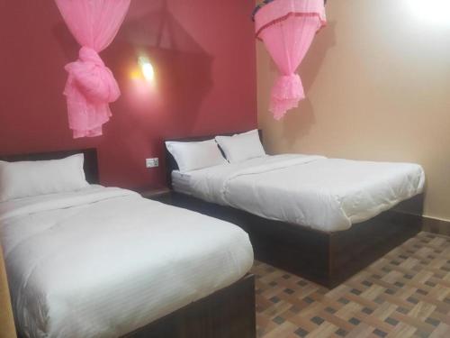 Un ou plusieurs lits dans un hébergement de l'établissement Hotel Sweetland