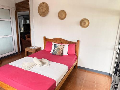 Una cama o camas en una habitación de Happy Destination Auberge