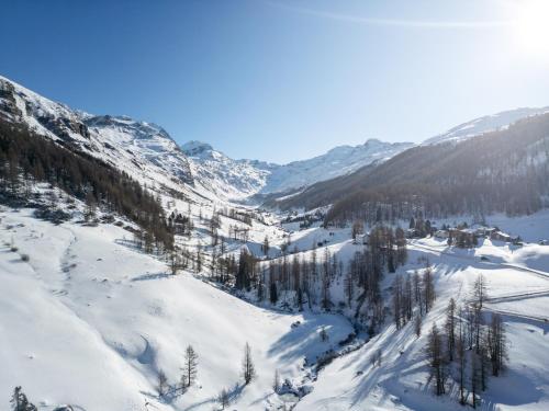 an aerial view of a snow covered mountain at Hotel Chesa Pool in Sils Maria