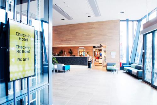 a hospital lobby with chairs and a sign on the wall at Best Western RC Hotel in Jönköping
