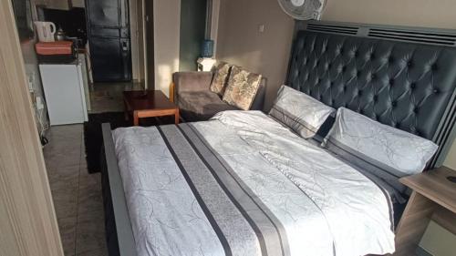 Postel nebo postele na pokoji v ubytování Airbnb in Nairobi