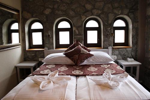 Postel nebo postele na pokoji v ubytování Hotel Divan